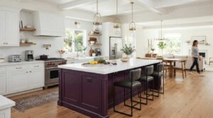 "aubergine purple kitchen island with white perimeter cabinets"